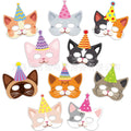 Assiettes, gobelets, serviettes et décoration de fête sur le thème du chat