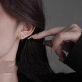 Boucles d'oreilles chat creux simples et mignonnes en argent hypoallergénique pour femmes et adolescentes
