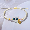Bracelets en perles de chat noir à grands yeux