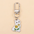 Porte-clés fleurs élégant en métal